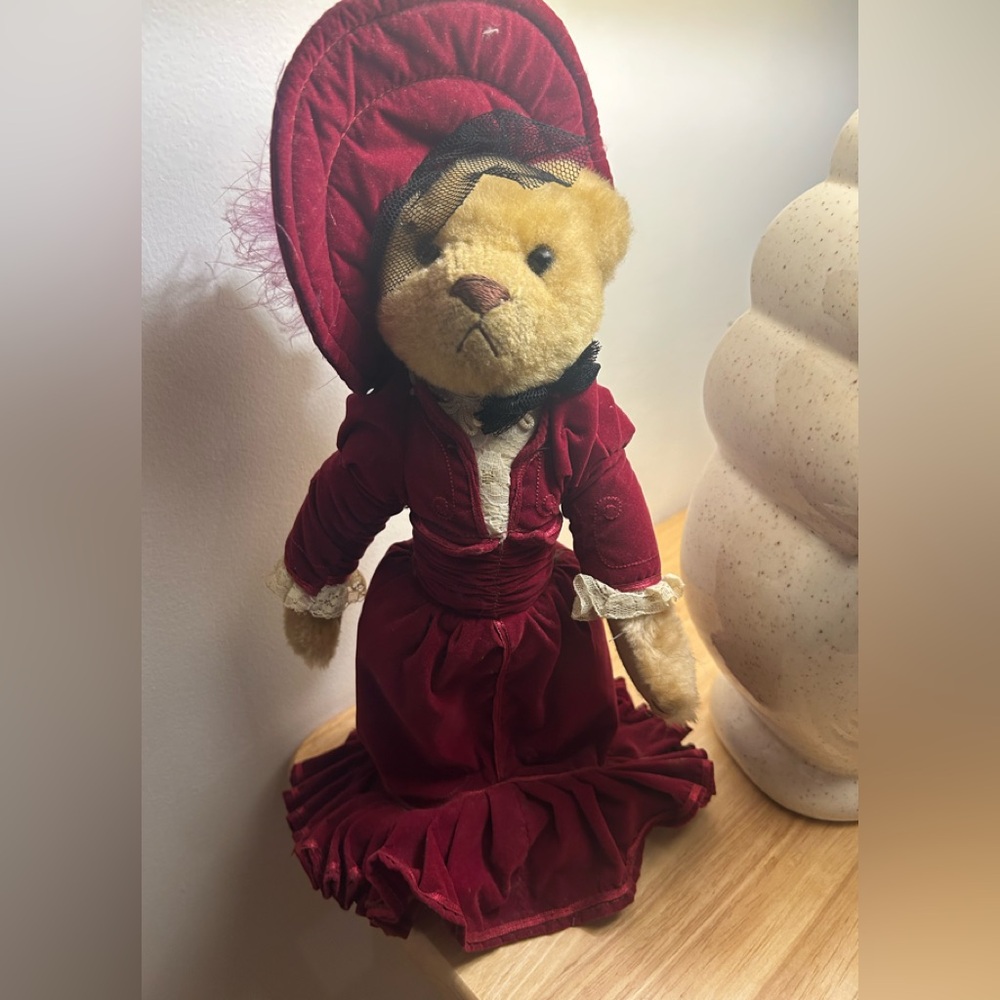 Doll bear with faux velvet dress